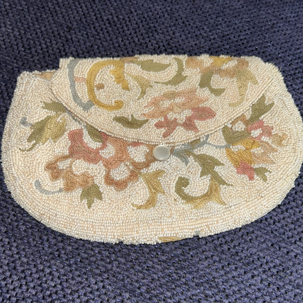 Vintage 1920’s French handed beaded clutch. Silk lined.